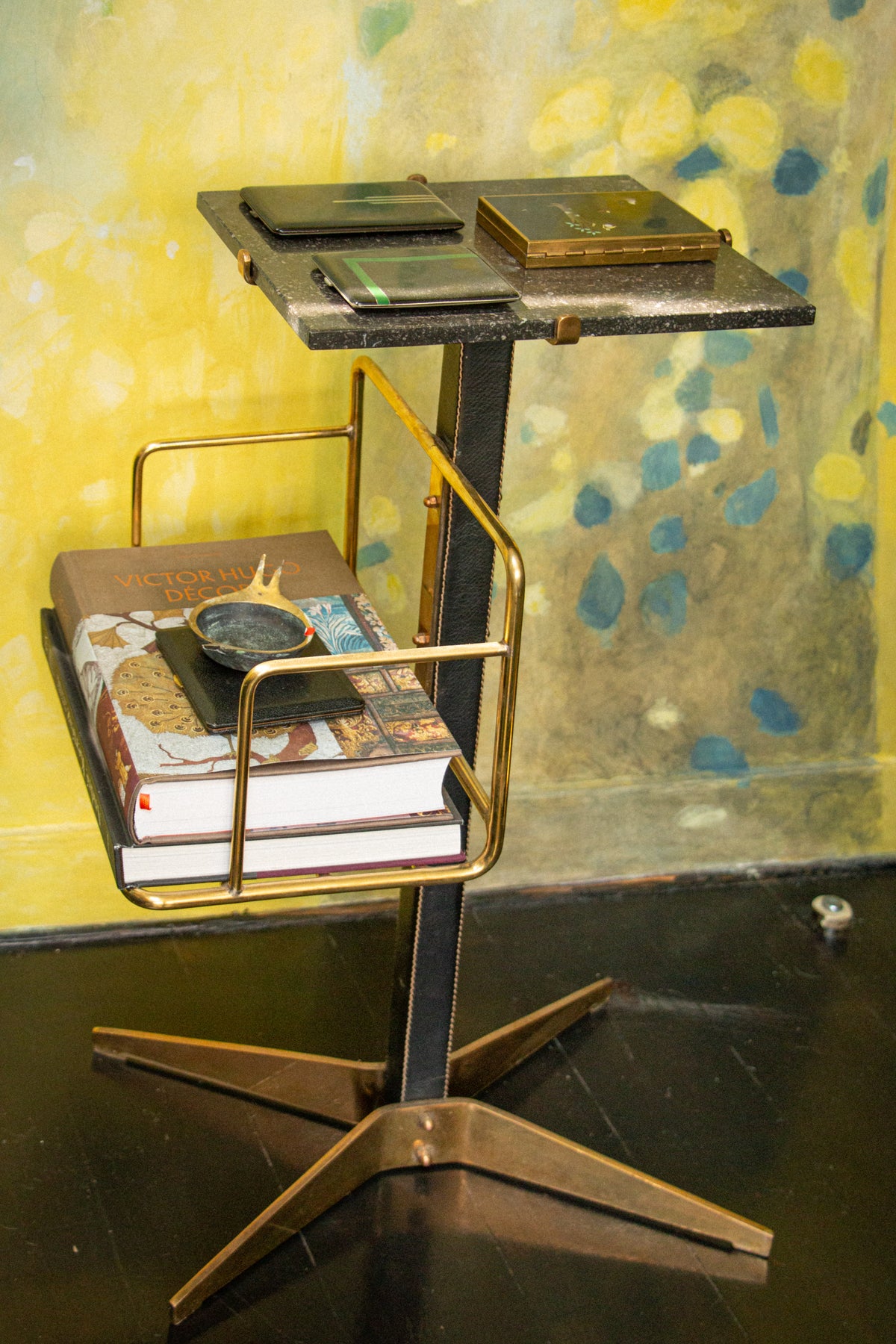 Very rare side table/bookshelf by Mathieu Matégot in brass and leather, 1950