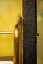 Very rare side table/bookshelf by Mathieu Matégot in brass and leather, 1950