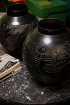 Two large Russian vases, 1920, in sculpted black ceramic