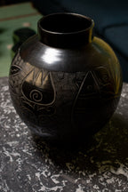 Two large Russian vases, 1920, in sculpted black ceramic