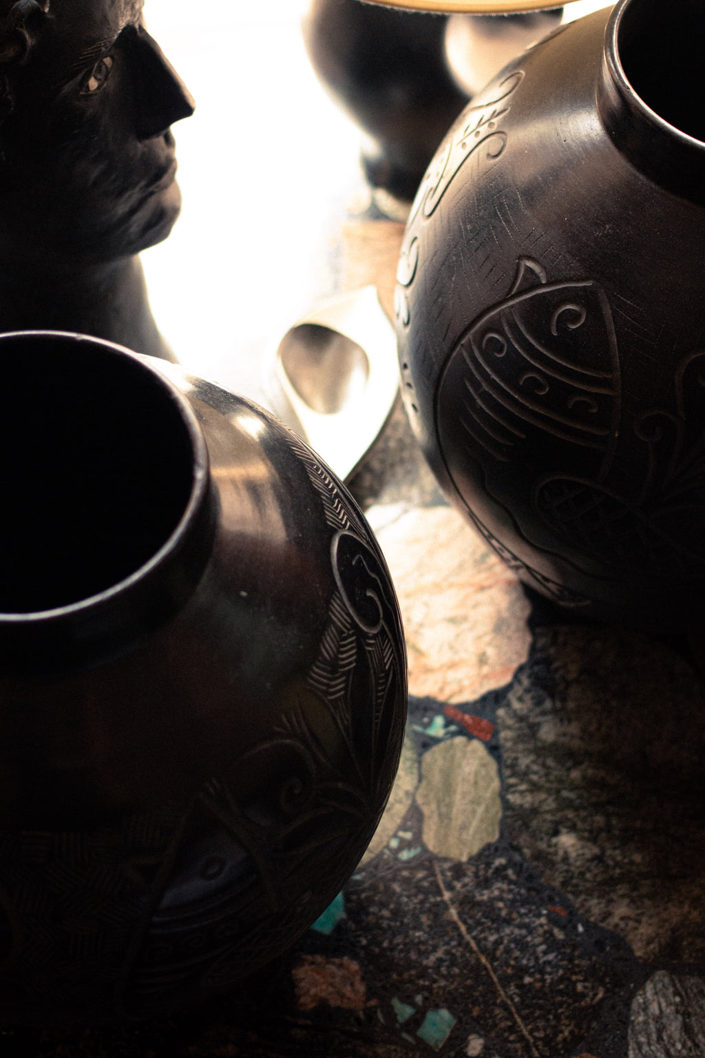 Two large Russian vases, 1920, in sculpted black ceramic