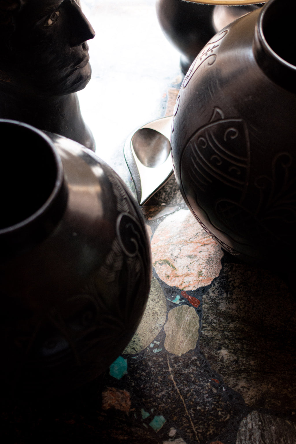 Two large Russian vases, 1920, in sculpted black ceramic