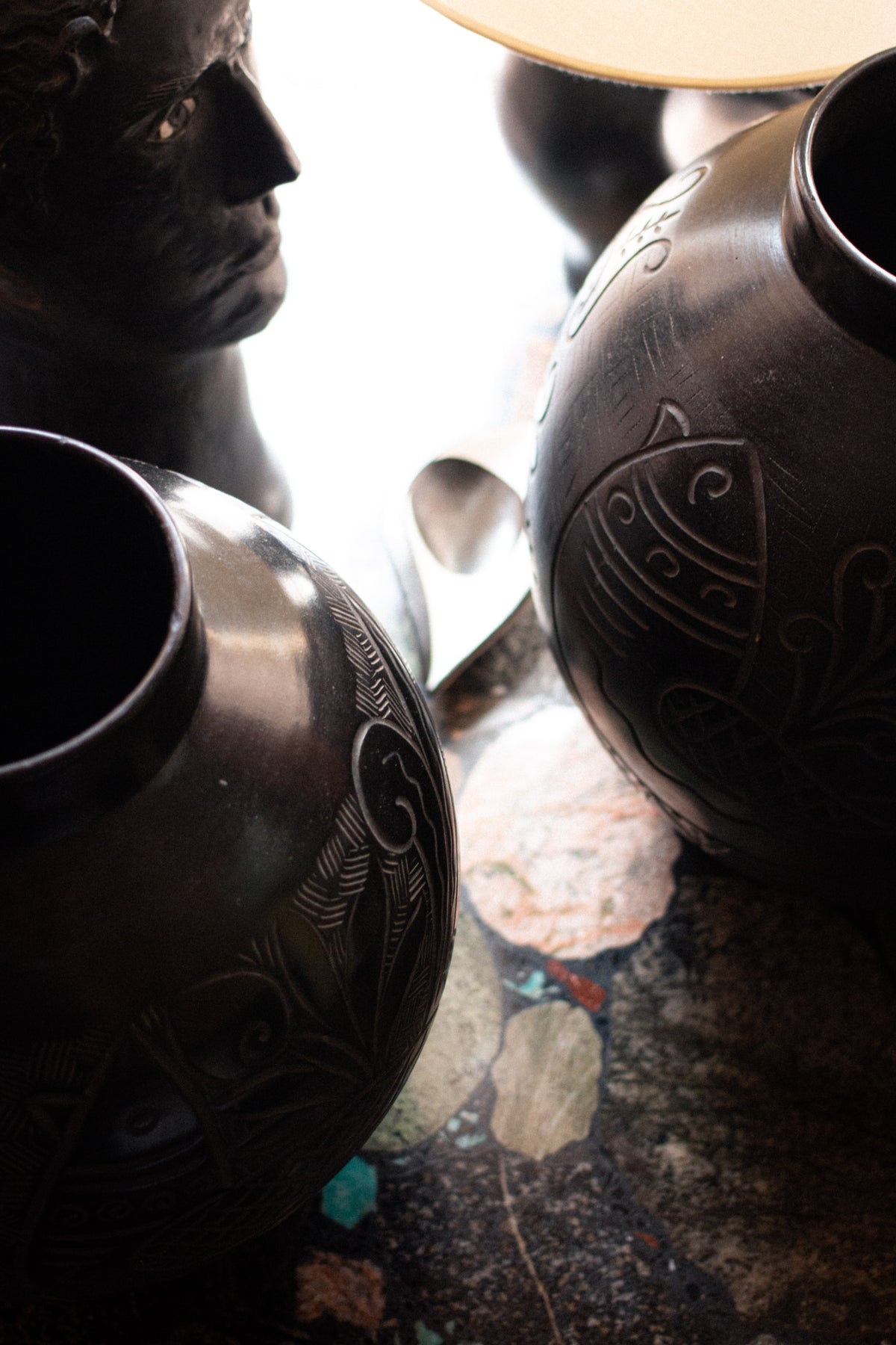 Two large Russian vases, 1920, in sculpted black ceramic